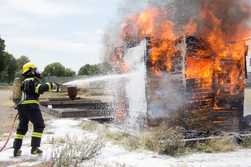 Firefighter training how to put out a structure fire