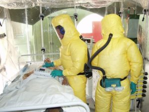 Doctors treating a patient with Ebola