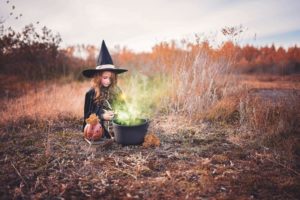 Girl creating Halloween treats