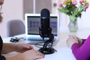 Women conducting a podcast on facility management